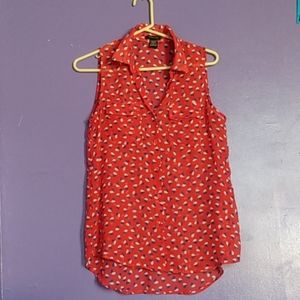 Red sleeveless collared blouse